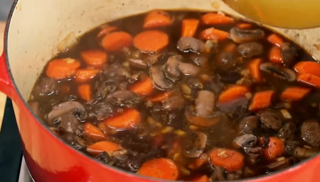 Add vegetables in mushroom pot