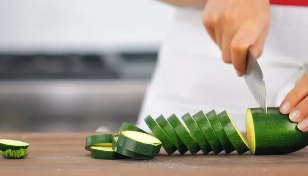 Cut zucchini into slices for chips