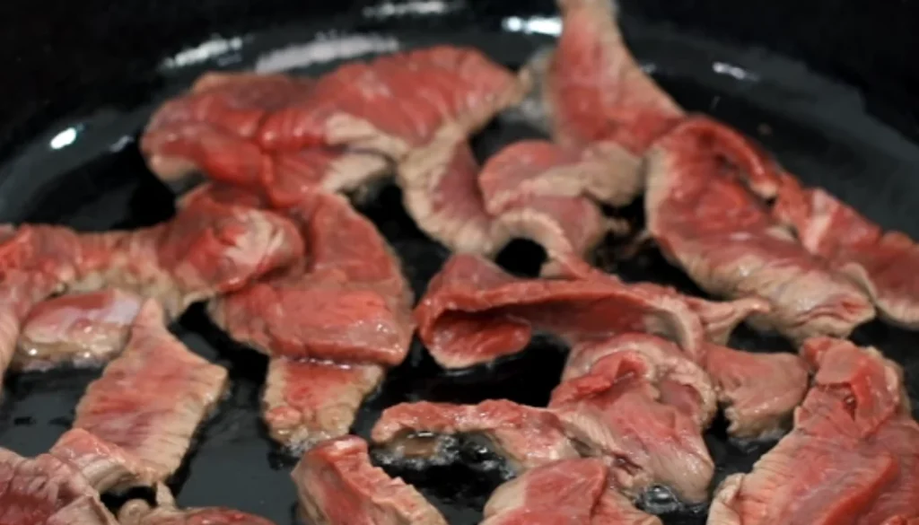 Fry beef strips for 2 minutes